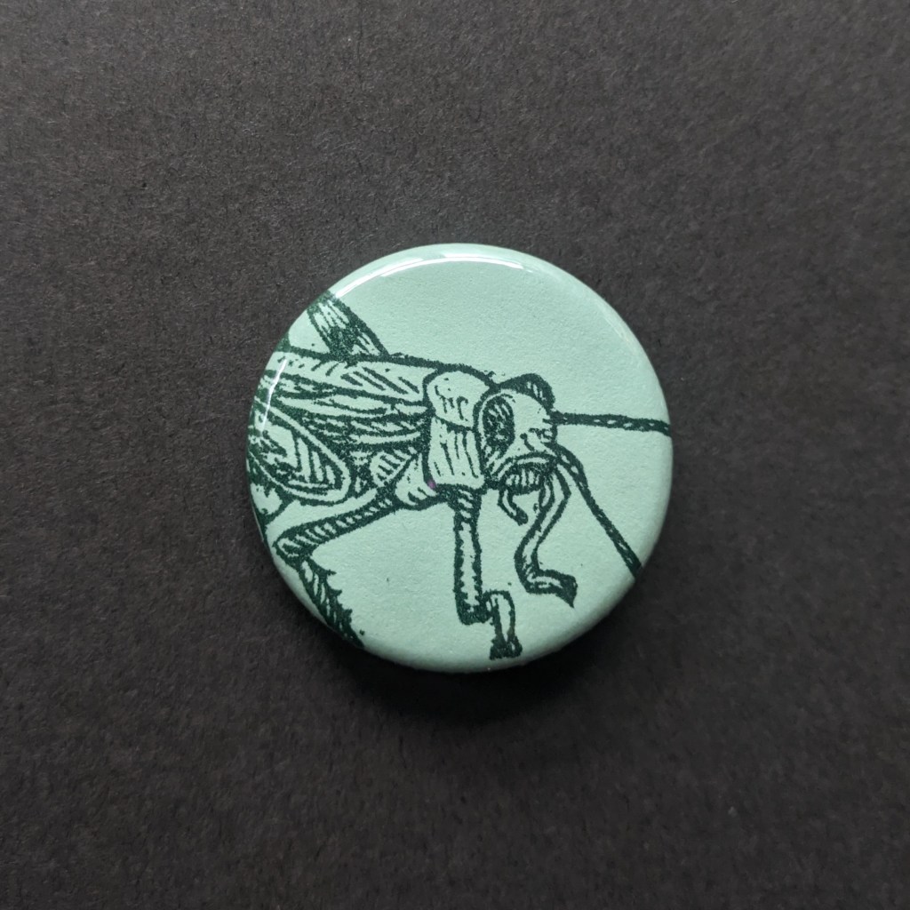 a button of a grasshopper